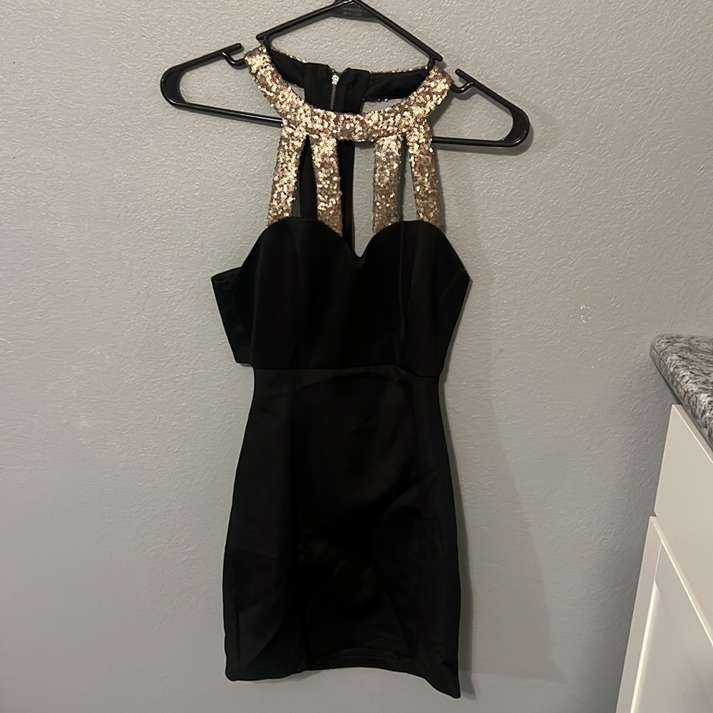 Black and gold sequence dress